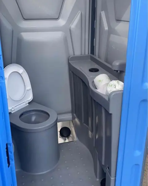 Inside a deluxe unit with a sink and mirror